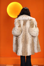 Load image into Gallery viewer, Mid-length women's natural lynx fur coat with shawl collar