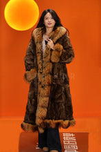 Load image into Gallery viewer, Penny lane in women's full length raccoon fur coat with shawl collar