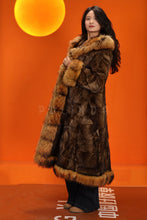 Load image into Gallery viewer, Penny lane in women's full length raccoon fur coat with shawl collar