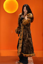 Load image into Gallery viewer, Penny lane in women's full length raccoon fur coat with shawl collar