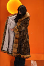 Load image into Gallery viewer, Penny lane in women's full length raccoon fur coat with shawl collar
