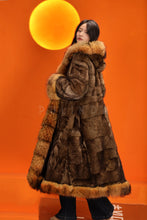 Load image into Gallery viewer, Penny lane in women's full length raccoon fur coat with shawl collar