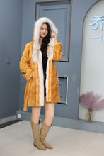 Load image into Gallery viewer, Mid-length Saga mink fur hooded coat with lynx trim