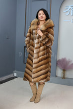 Load image into Gallery viewer, Full length muskrat fur hooded coat with racoon trim