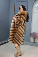 Load image into Gallery viewer, Full length muskrat fur hooded coat with racoon trim