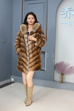 Load image into Gallery viewer, Full length muskrat fur hooded coat with racoon trim