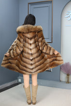 Load image into Gallery viewer, Full length muskrat fur hooded coat with racoon trim
